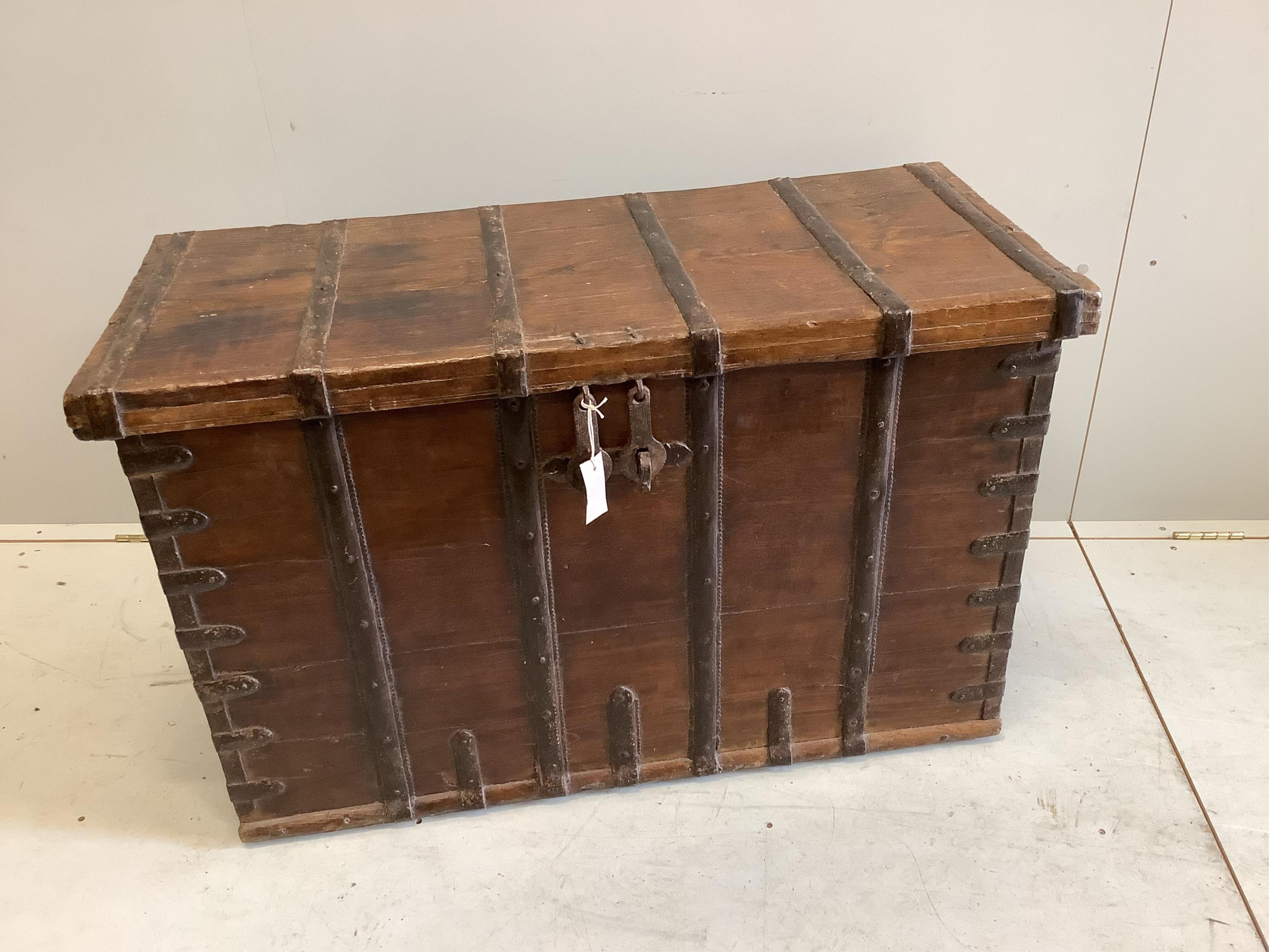 An iron bound hardwood trunk, width 102cm, height 65cm. Condition - fair to good